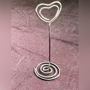 Place card holders for event. Silver toned